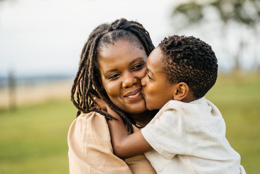 Woman and son hugging 