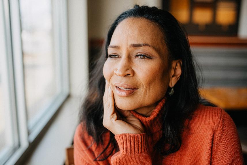 Woman looking out a window