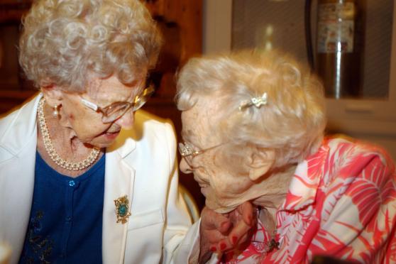 Two older women smiling
